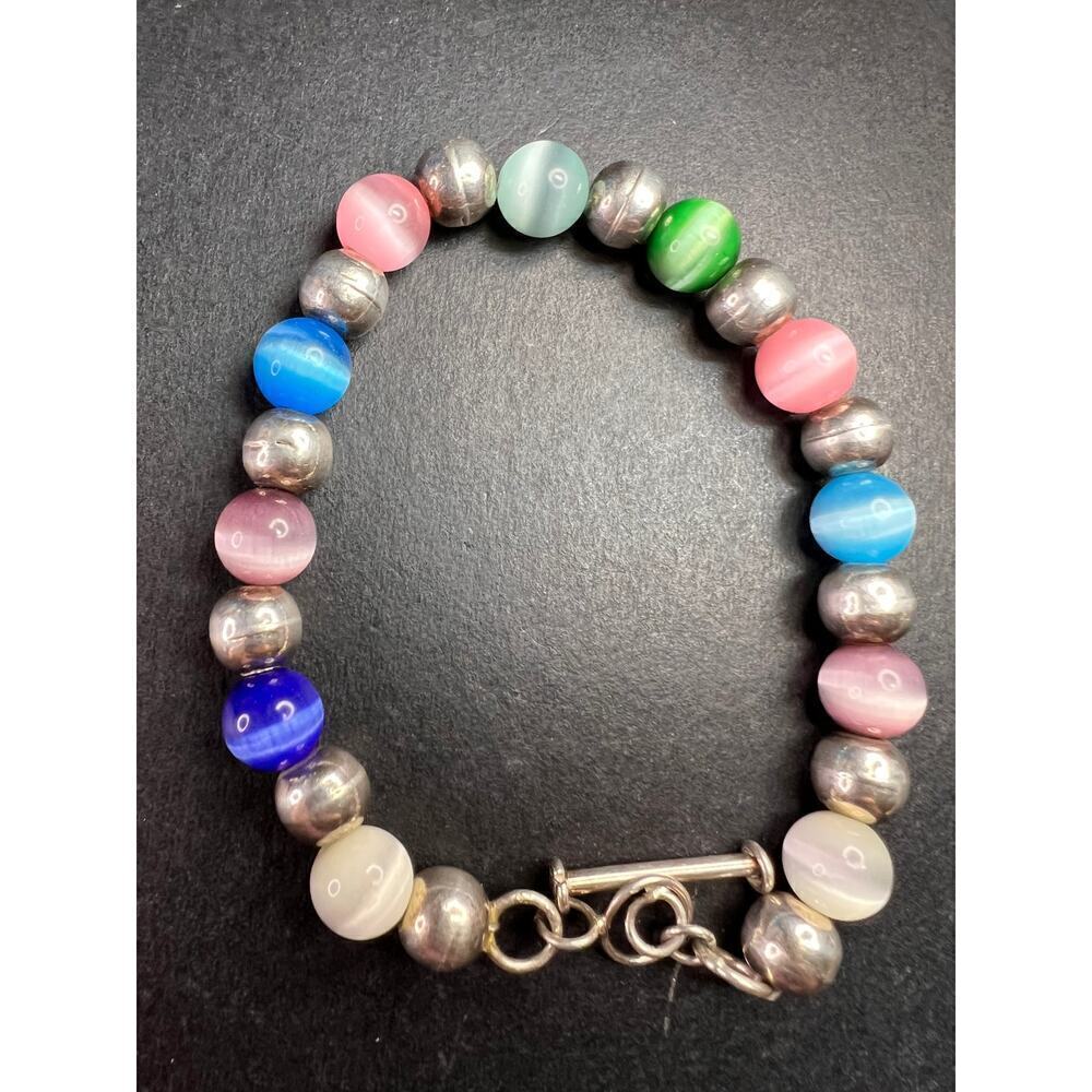Vintage sterling silver and cats eye glass toggle bracelet